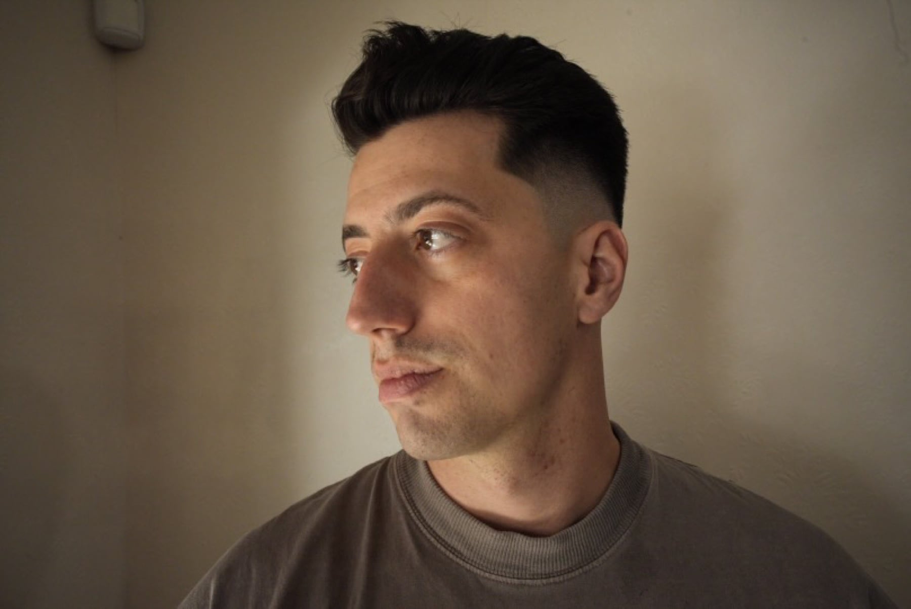Finished short haircut in warm side light