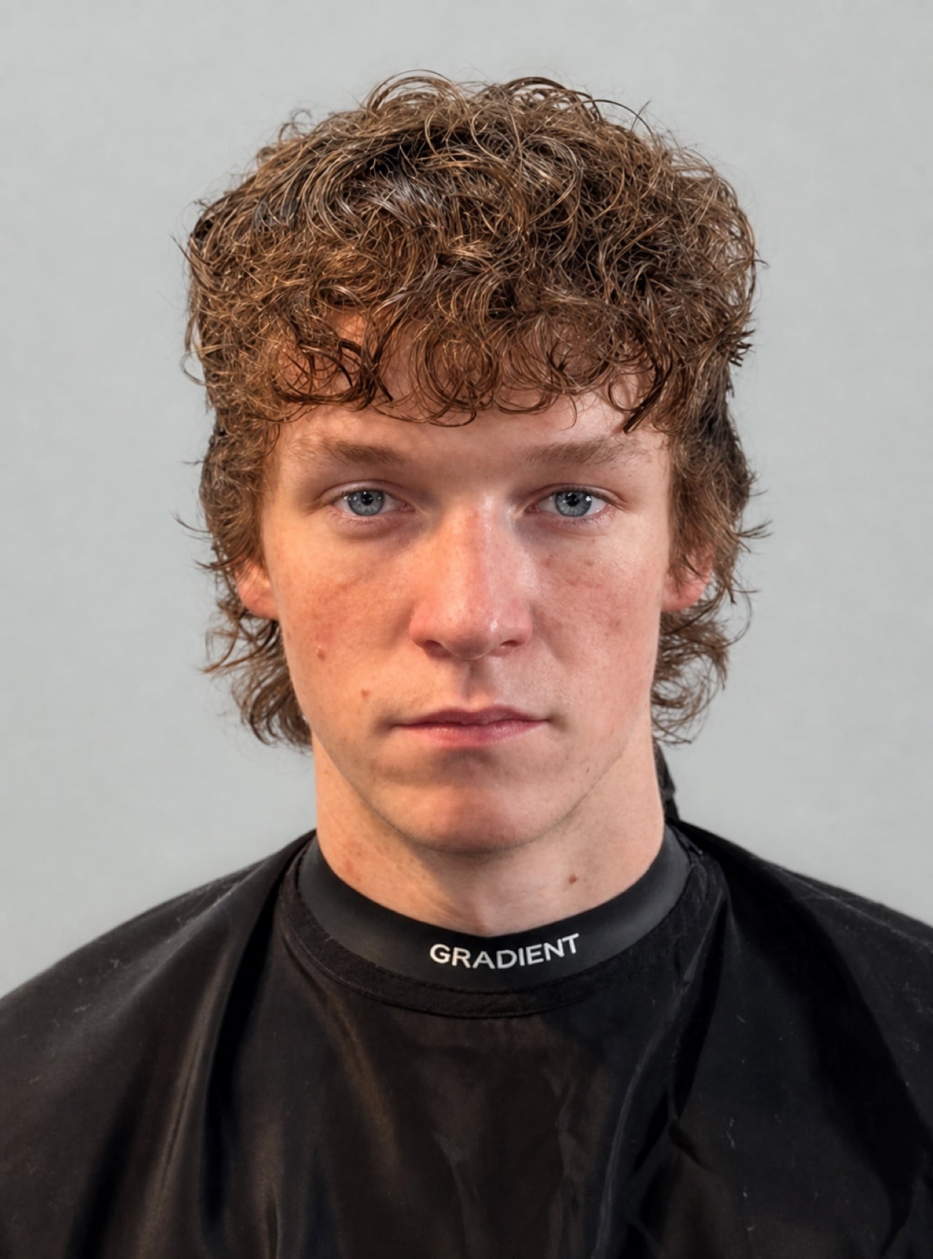 Curly strawberry-blond haircut from the front